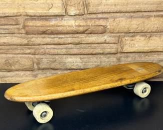 Vintage 1960s skateboard with clay wheels