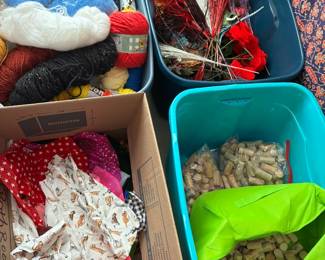 Yarn, fabric, wine corks, and silk flowers