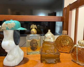 Avon perfume bottle collection in various shapes