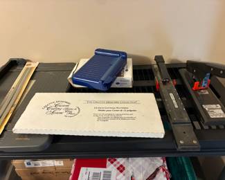 Paper cutters and staplers