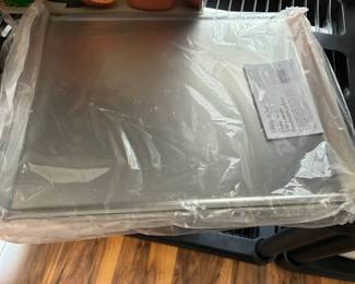 Pampered Chef baking sheets, new in plastic