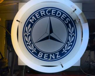 Porcelain enamel Mercedes sign with fluorescent tube. 