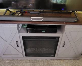 Great TV stand with fireplace built-in