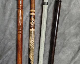 Mens Skull handle custom carved walking sticks.