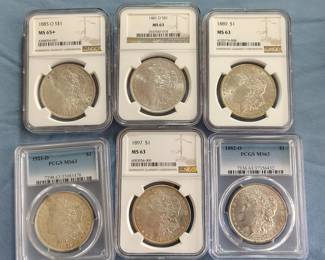 Graded Morgan Silver Dollars . All graded mint state (more not pictured)