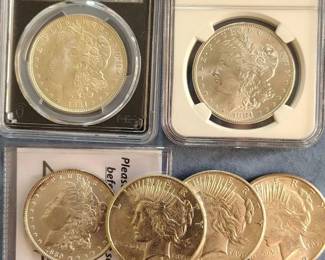 Morgan and Peace  silver dollars