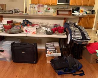 Dishes, cookware, suitcases