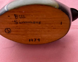 Lot 179: Two carved wooden duck decoys signed by Bill Simmons (1979–1980)