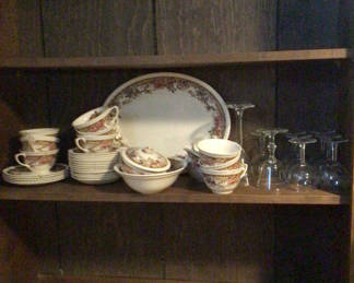 Lot 382: Floral pattern china dinnerware set with plates, bowls, cups and stemware