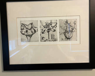 Lot 85: Three-panel botanical print in black frame