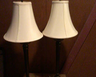 Lot 167: Pair of black metal table lamps with cream fabric shades