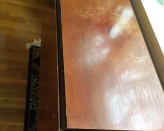Lot 57: Wooden dining table with pedestal base