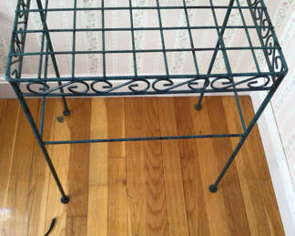 Lot 5: Wrought-iron grid-top four-legged stand