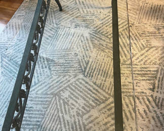 Lot 56: Glass-top coffee table with ornate wrought-iron grapevine frame 50x24