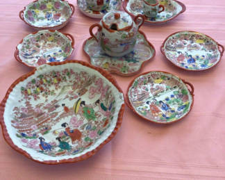 Lot 49: Japanese porcelain dinnerware set with colorful transfer prints