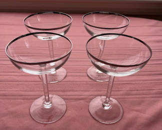Lot 46: Four silver-rimmed cocktail glasses