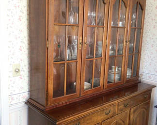 Lot 6: Wooden china cabinet with glass-front display and lower storage