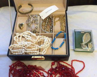 Lot 136: Jewelry box with assorted necklaces and bracelets