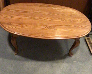 Lot 166: Oval wooden coffee table with curved legs