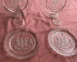 Lot 12: Set of four embossed Christmas glass plates