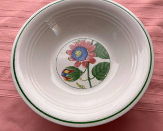 Lot 38: Floral ceramic serving bowl with green rim 