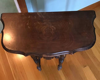 Lot 125: Antique dark wood table with carved apron