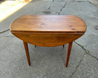 Lot 28: Antique Round Drop Leaf Table 