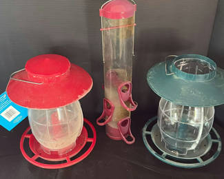 Lot 29: Assorted household items: lanterns, bird feeder, glassware jars, framed art, scale and hardware