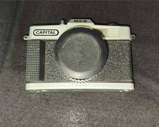 Lot 30: Collection of vintage film and digital cameras