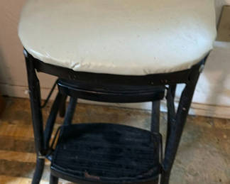 Lot 109: Padded black metal two-tier step stool and wooden chair with a woven seat