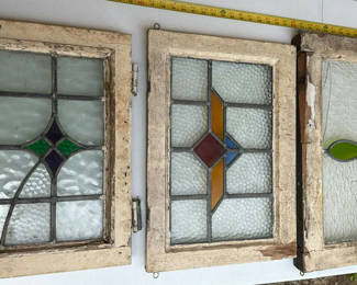 Lot 119: Three stained glass window panels with geometric designs