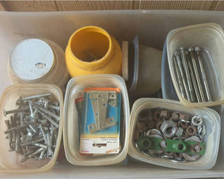 Lot 222: Assorted metal hardware and fasteners in plastic bins