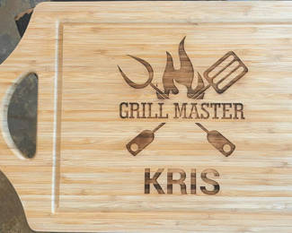 Lot 290: Grill Master Kris Cutting Board