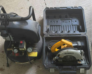 Lot 213: Air compressor and DeWalt circular saw with carrying cases