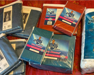 Lot 111: Blue MyPillow bedding and Burlington blackout drapery