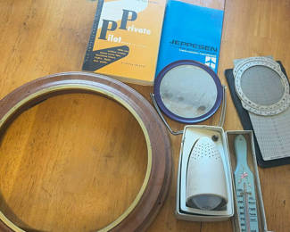 Lot 287: Vintage aviation navigation instruments and manuals