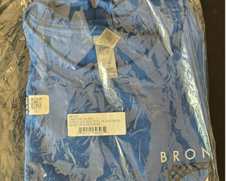 Lot 36: Blue packaged garment, embroidered satin caftan, patterned scarf, and woven wall hanging