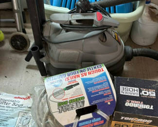 Lot 126: Wet-dry vacuum with hoses and garden hose accessories