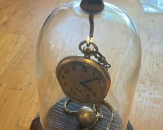 Lot 282: Antique pocket watch under glass dome
