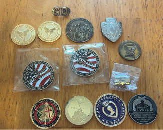 Lot 262: Military-themed collectible coins, medallions, patches, and pins