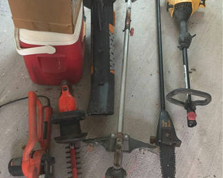 Lot 210: Assorted lawn and garden power tools