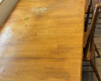 Lot 135: Wooden dining table with carved-back chairs