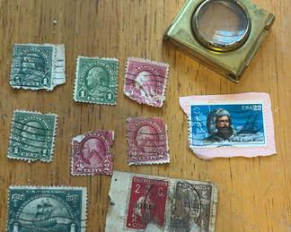 Lot 277: Vintage US stamps and brass magnifier