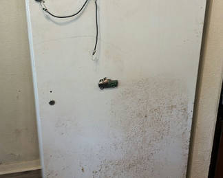 Lot 248: White upright refrigerator with assorted stored items