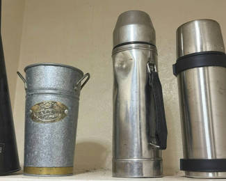 Lot 241: Assorted vintage metal kitchen containers, thermoses, and an oil lamp
