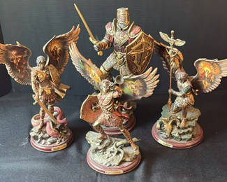 Lot 6: Collection of angel and archangel figurines: St. Michael, St. Gabriel, and St. Raphael