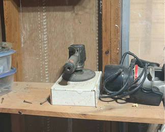 Lot 235: Garage workshop with power tools and hardware storage