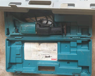 Lot 225: Angle grinder, air filter kit, and assorted tool cases