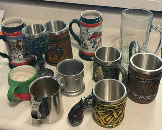 Lot 246: Assorted beer steins and mugs