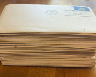 Lot 279: First Day of Issue stamp covers and a stack of envelopes